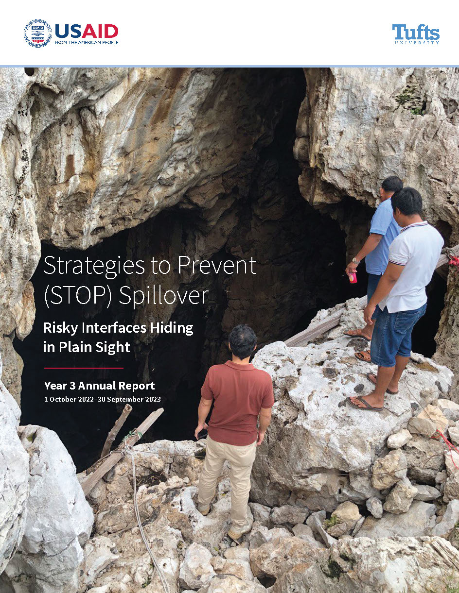 Thumbnail of report cover. Which has a photo of a group of people looking at large crevice. 
